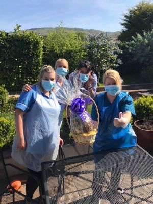 Presenting an Easter Egg to a Care Home in Draycott